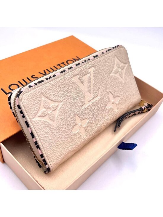 LOUIS VUITTON Wallet: Monogram Empreinte Zippy WildAtHeart  Louis Vuitton Monogram Empreinte Wild at Wallet Beige
